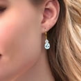 thumbnail image 2 of Gem Stone King 18K Yellow Gold Plated Silver Sky Blue Topaz and Lab Grown Diamond Dangle Earrings for Women | 6.74 Cttw | Gemstone November Birthstone | Oval 10X8MM, 2 of 4