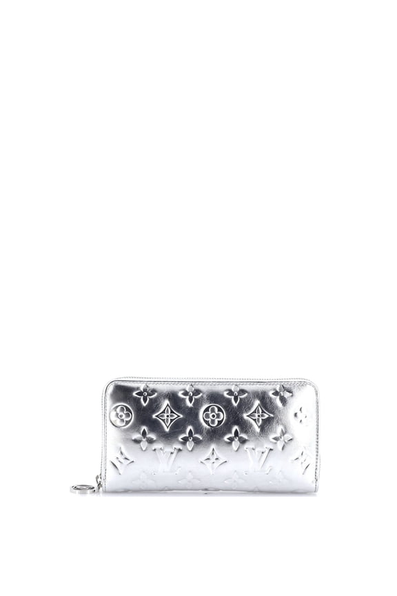 Pre-Owned Coussin Zippy Wallet LV Ski Monogram Embossed Lambskin By Rebag