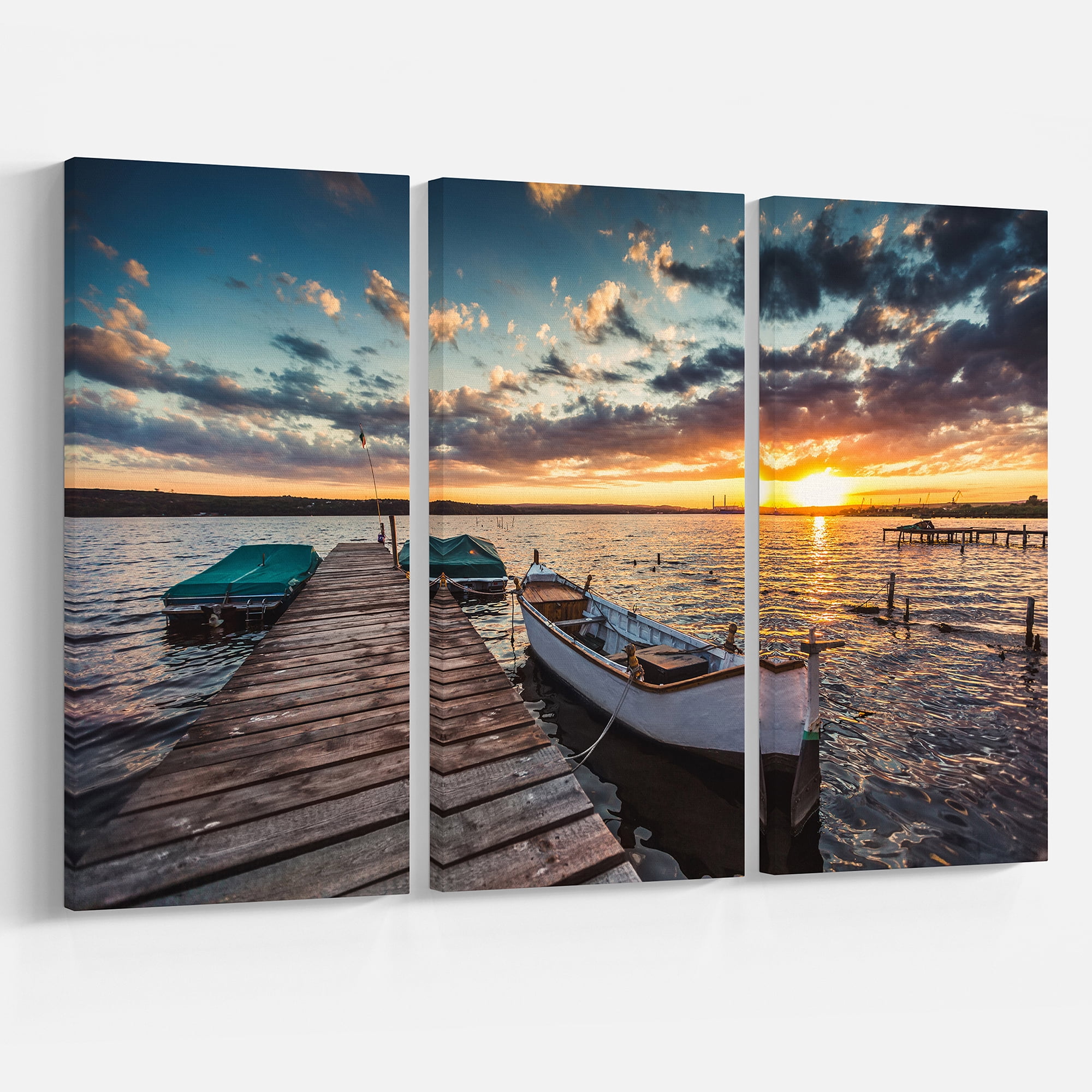 Designart 'Boats and Jetty under Dramatic Sky ' Modern Canvas Art Print