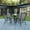 Gray, variant on BizChair 5 Piece Outdoor Patio Dining Set - 31.5" Round Tempered Glass Patio Table, 4 Gray Flex Comfort Stack Chairs