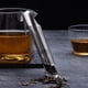 thumbnail image 2 of Difusor de té de acero inoxidable 2024 Actualización Artefacto de té Tubo Infusor de té de acero inoxidable con mango de gancho para colgar Orificios finos Difusor de intervalo de té o café de hojas, 2 of 8
