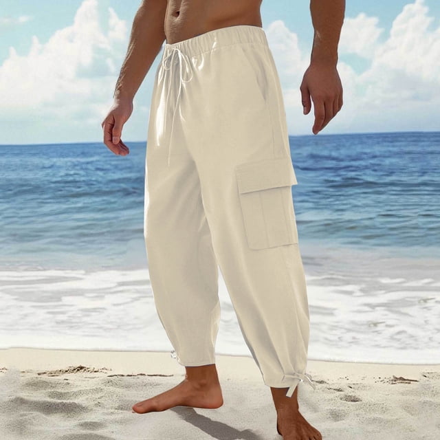 Pantalones largos para hombre, de color liso, holgados, informales, con bolsillos grandes, de lino, cintura elástica y cordón ajustable, de poliéster.
