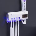 thumbnail image 1 of Portacepillos de dientes con esterilizador UV, dispensador automático de pasta de dientes y exprimidores, 1 of 5