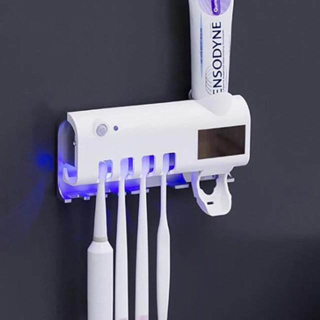 Portacepillos de dientes con esterilizador UV, dispensador automático de pasta de dientes y exprimidores