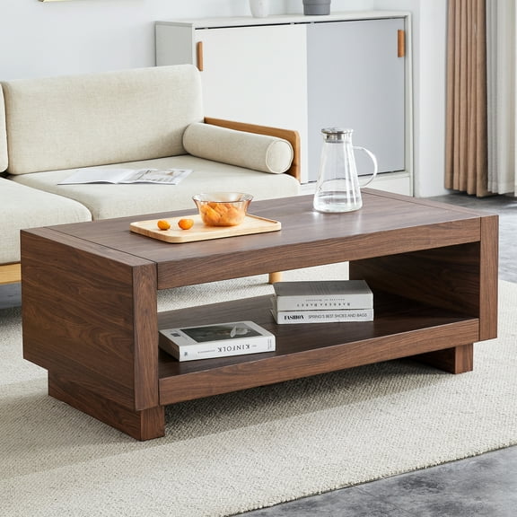 A modern minimalist MDF walnut-colored rectangular coffee table measuring47.2*23.6*18 inches embodies the simple charm of mid-century aesthetics, adding a touch of elegance to your living room.