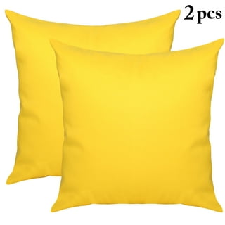 Bright yellow decorative pillows top