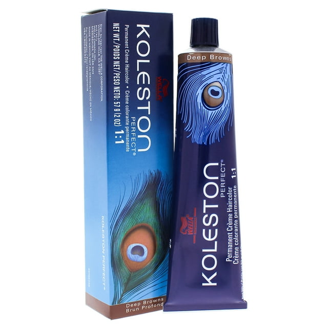 color de pelo wella koleston perfect 6 74 rubio oscuro-marrón rojo 2 oz tubo y caja frontales, vista centrada; tubo azul marino con tapa negra y texto vertical blanco "KOLESTON", caja a la izquierda con ilustración de pluma de pavo real y texto de producto en los laterales. A menudo usado por estilistas para retoques de raíces y aplicaciones de color puntual.