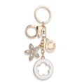 thumbnail image 4 of Backpack Accessory Keychain Charm with Gold Tone Flower Pendant, Round Attachment Loop and Lobster Clasp for Bags, 4 of 9
