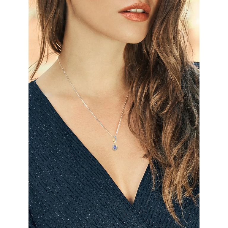 Sterling Silver Tanzanite & Diamond Infinity Pendant Sterling Silver Tanzanite & Diamond Infinity Pendant