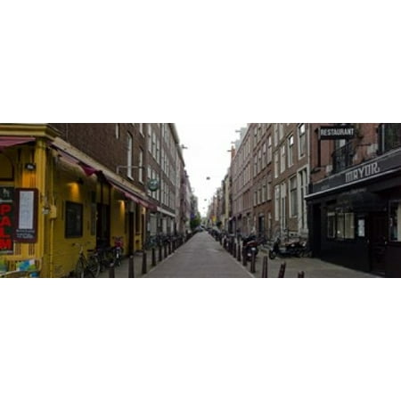 Restaurants in a street Amsterdam Netherlands Canvas Art - Panoramic Images (15 x