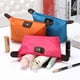 thumbnail image 4 of Bolsa de cosméticos portátil multifuncional de color caramelo, bolsa de nailon con forma de bola de masa para cosméticos, bolsa de lavado de almacenamiento impermeable, 4 of 6