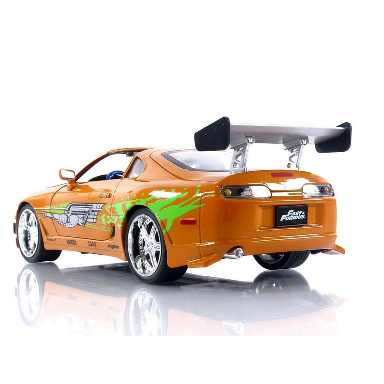 1995 Toyota Supra Orange Metallic with Lights and Brian Figurine