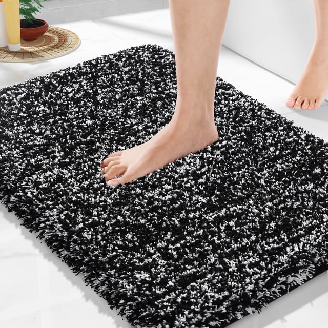 Alfombra de baño Yimobra, antideslizante, lavable, 60 x 43 cm, color blanco y negro