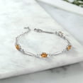 thumbnail image 3 of Gem Stone King 925 Sterling Silver Orange Red Madeira Citrine and White Moissanite Tennis Bracelet for Women | 3.10 Cttw | Gemstone November Birthstone | Oval 7X5MM | 6 inch + 1 inch Extender, 3 of 4