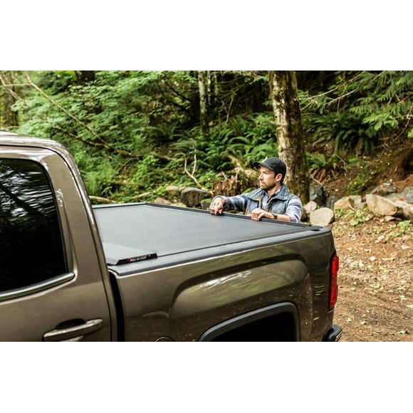 Fits 2016-2023 Toyota Tacoma Roll-N-Lock Tonneau Cover 531A-XT A-Series XT; Manual Retractable; Lockable; Black Powder Coated; Aluminum; With T-Slot Rails