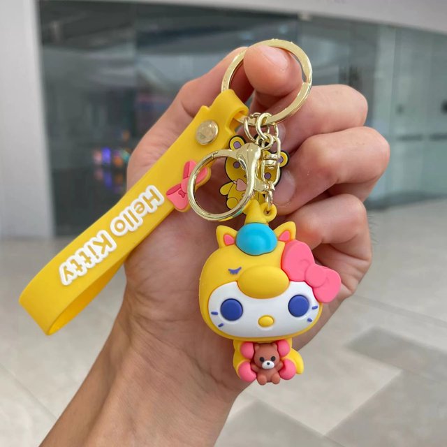 Llavero de muñeco Sanrio, venta al por mayor, bolso bonito de Sanrio para niñas, colgante de pingüino, pudín, perro, Rana, regalo, llavero de dibujos animados, novedad de 2023