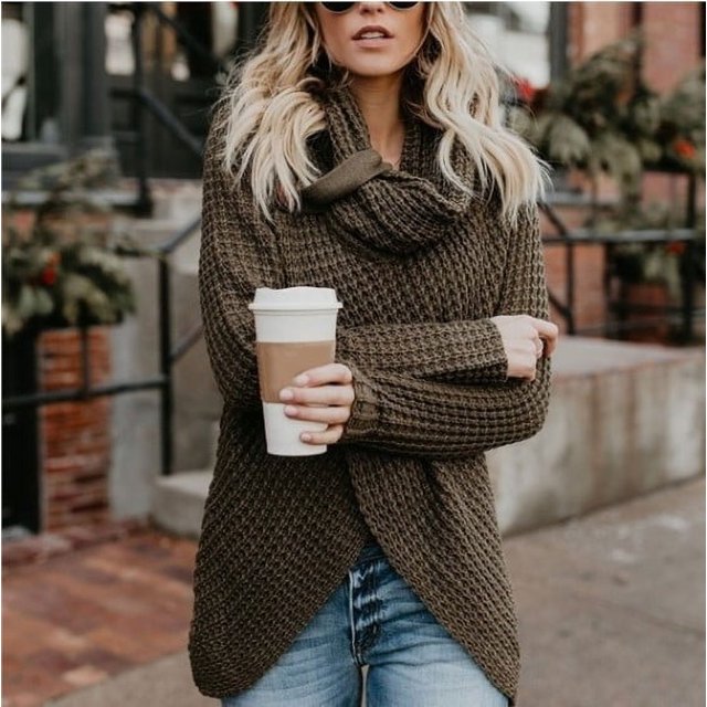Suéter de punto irregular de manga larga con abertura distintiva y cuello redondo para mujer de estilo europeo y americano para otoño e invierno