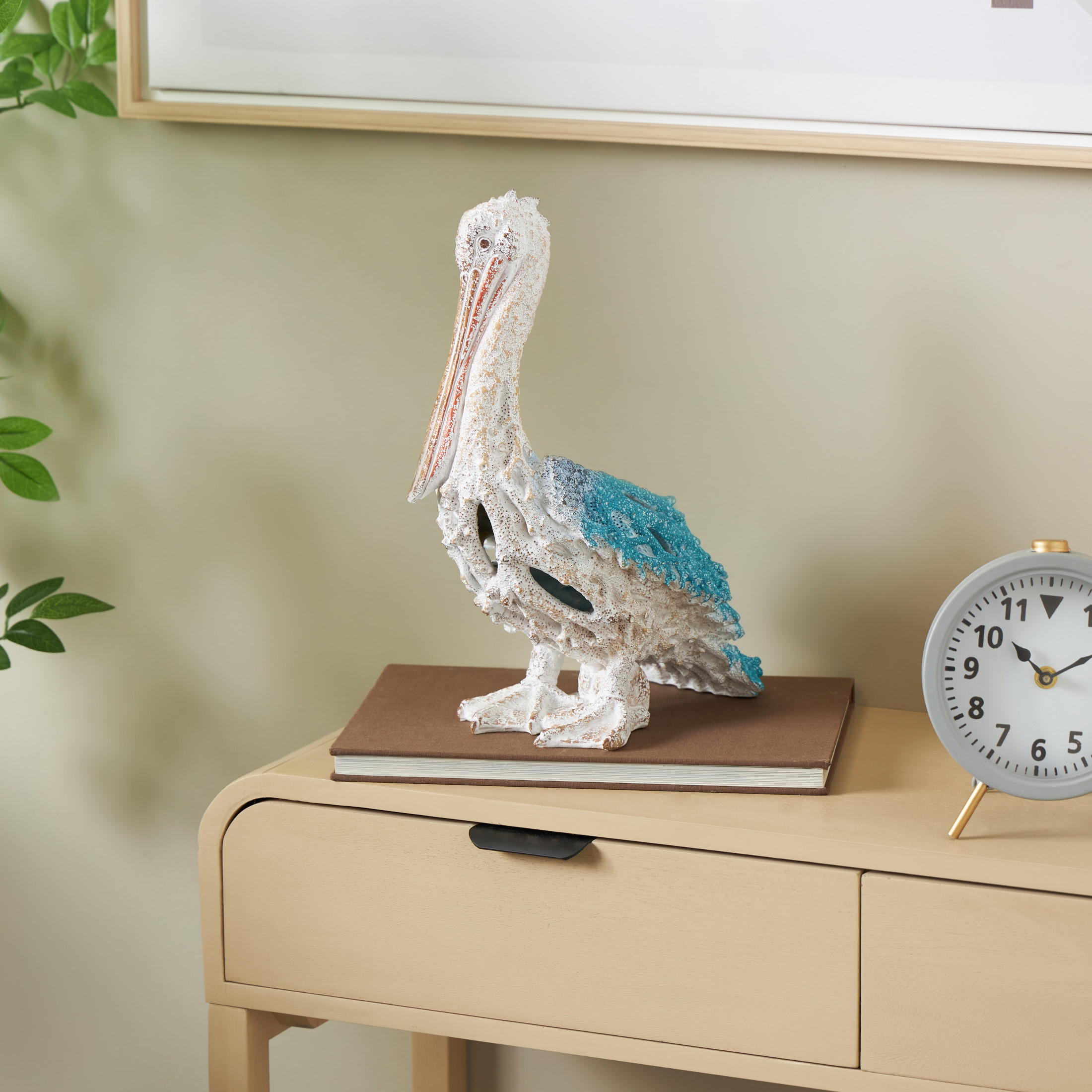 10" x 14" Blue Polystone Textured Pelican Sculpture with Blue Feathers, by DecMode