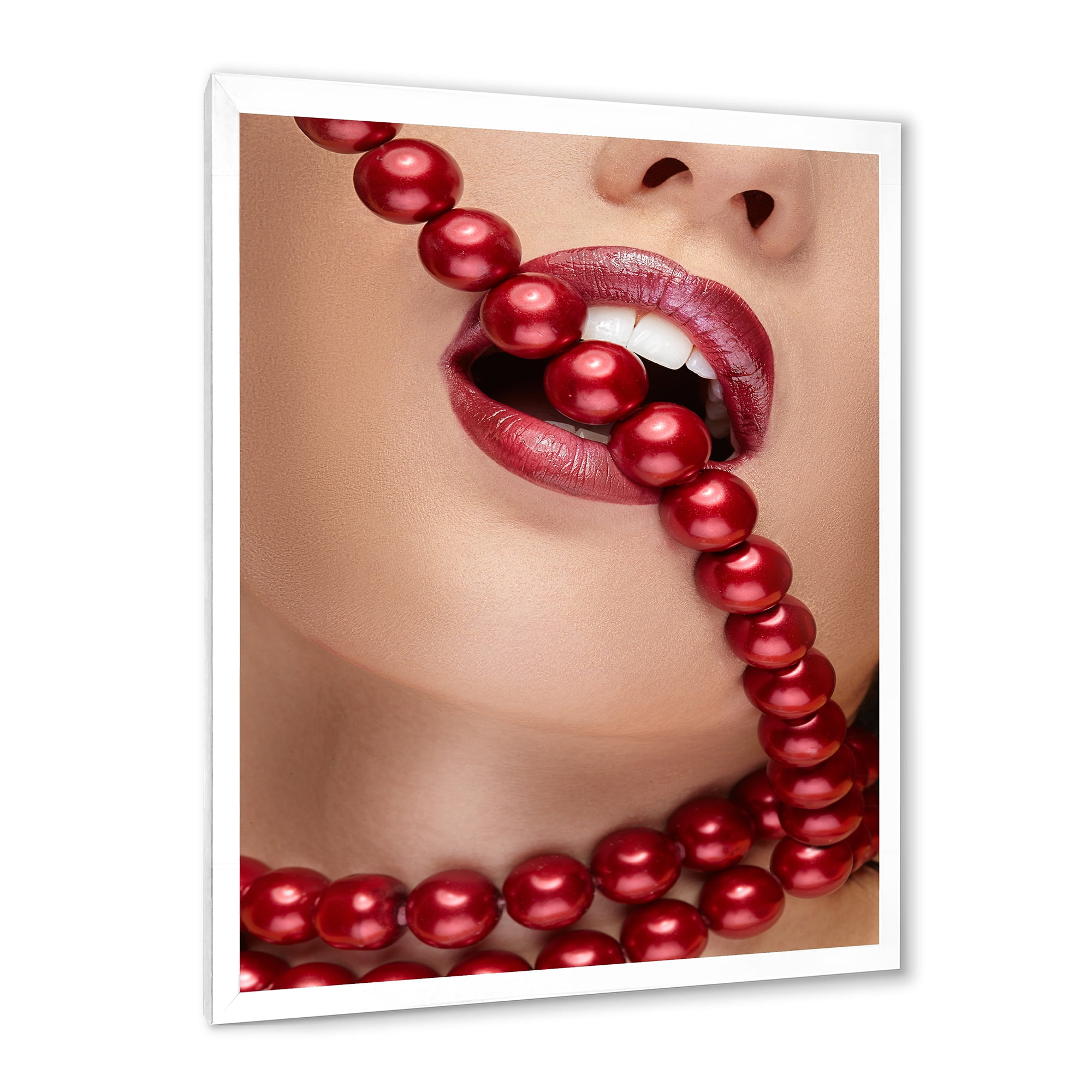 Designart 'Girl Mouth With Red Lipstick Biting Red Pearls' Modern Framed Art Print