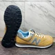 thumbnail image 1 of New Balance 574 Mustard Tan Suede Sneakers U574PGW Men’s Size 9.5, 1 of 6