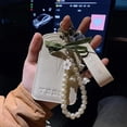 thumbnail image 6 of 2Pcs Cute Lily Sakura Flower Keychains Wristlet for Women, Pearl Key Chains for Car Keys Bow Keychain Accessories, 6 of 7