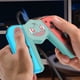 thumbnail image 1 of Empuñadura de carga Empuñadura de carga de velocidad antideslizante para controladores OLED de Nintendo Switch, 1 of 5