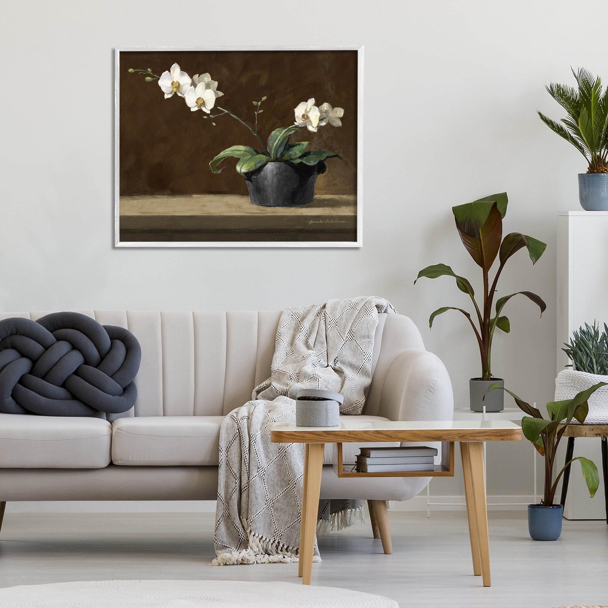 Stupell Industries Potted White Orchid on Ledge White Framed Giclee Art, design by Yumiko Ichikawa