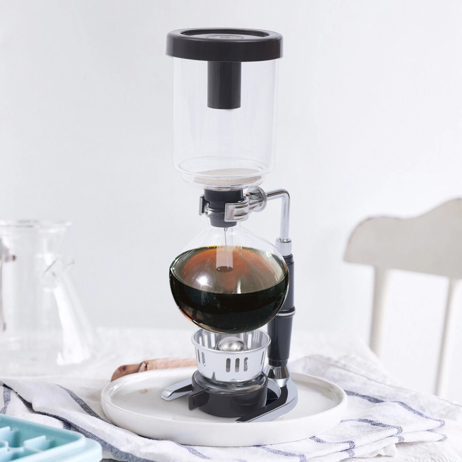 siphon coffee maker with fresh espresso in glass coffee pot on