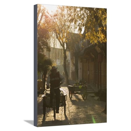 Street scene, Lijiang, UNESCO World Heritage Site, Yunnan, China, Asia Stretched Canvas Print Wall Art By Ian