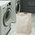 thumbnail image 1 of Fiudx Cesta de Ropa Plegable, Diseño de Tela Beige, Ahorra Espacio, Ligera y Portátil, Gran Capacidad, Fácil de Guardar, Ideal para Dormitorios y Apartamentos, Tamaño 55 X 41 X 29 Cm., 1 of 5