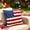 A, variant on Red White Blue Lumbar Pillow, Flag Bow Patriotic Throw Cushion, Vibrant Usa Themed Home Ornament To Spruce Up Indoor Space On Fourth of July Celebrations.