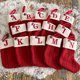 thumbnail image 1 of Medias navideñas con iniciales, 18 cm, letras pequeñas bordadas, tejidas en rojo y blanco, para decorar las fiestas familiares y la chimenea del árbol de Navidad., 1 of 8