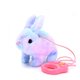 thumbnail image 1 of Juguete electrónico interactivo de conejito con orejas que se mueven y sonido; se tira de la cuerda; suave y mimoso; para niños y bebés; juego en interiores y exteriores; compañero imaginativo, 1 of 1