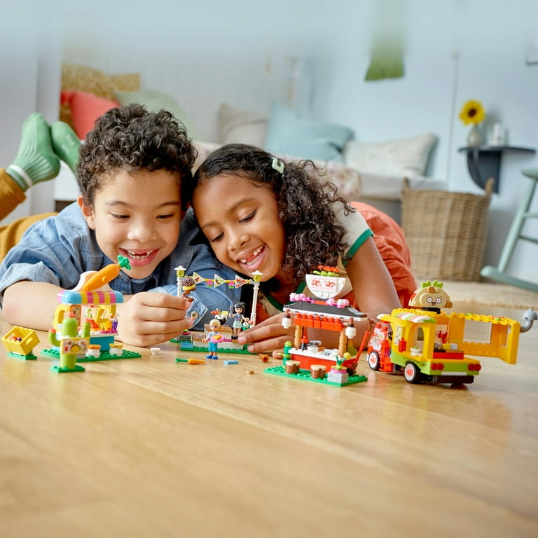 People playing hotsell with legos