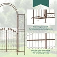 thumbnail image 4 of Outsunny 7' Metal Garden Arbor, Garden Arch with Gate, Fleur De Lis Motif, Latching Doors, Planter Shelves, Brown, 4 of 9
