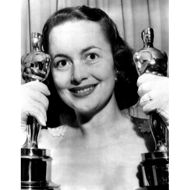 Olivia De Havilland With Her Academy Awards For To Each His Own And The ...