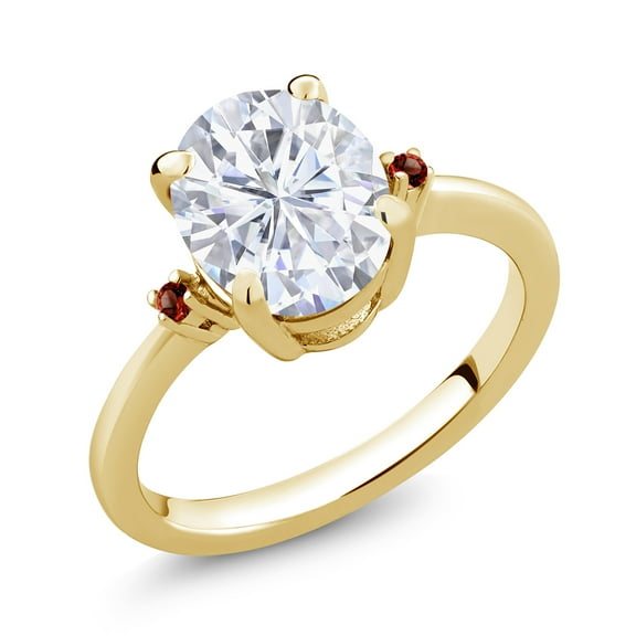 Gem Stone King 18K Yellow Gold Plated Silver White Moissanite and Red Garnet 3 Stone Ring for Women (3.04 Cttw, Oval 10X8MM, Gemstone Birthstone, Size 7)