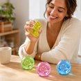 thumbnail image 3 of Coconut Oil Squishy with shiny flower and star sequins, Coconut Oil Slow Rising Squeeze Stress Ball Clear Jelly Bubblegum Texture Coconut Oil Squishy Toy,Yellow, 3 of 4
