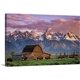 thumbnail image 1 of Cuadro decorativo lienzo panorámico paisaje Gran Teton granero de madera búfalos pradera verde montañas nevadas cielo atardecer tonos rosa obra western rústica, 1 of 7
