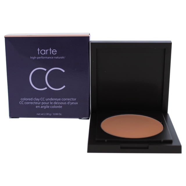 tarte ocultador corrector de ojeras coloured clay cc - claro-medio 0.08 oz tarte ocultador 0.08 oz Estuche negro abierto con corrector en polvo tono claro-medio en bandeja circular, junto a la caja morada con logo tarte y grandes letras 'CC'.
