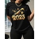 thumbnail image 1 of Camiseta para mujer con estampado "2025 Champagne", cuello redondo, manga corta, ligeramente elástica, corte regular, para todo el año (sin acolchado en el pecho), estilo jersey. Para adultos, hombre, 1 of 6