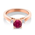 thumbnail image 3 of Gem Stone King 18K Rose Gold Plated Silver Red Created Ruby and White Topaz 3-Stone Engagement Ring for Women (1.28 Cttw, Round 6MM, Gemstone July Birthstone, Size 7), 3 of 6