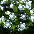 thumbnail image 2 of KOMI Solar Flower Lights,Waterproof 23ft/7M 50LED Peach Blossom Flower Solar Fairy Decorative String Lights for Outdoor Gardens Homes Wedding Christmas Party Lighting Decorations(White), 2 of 9