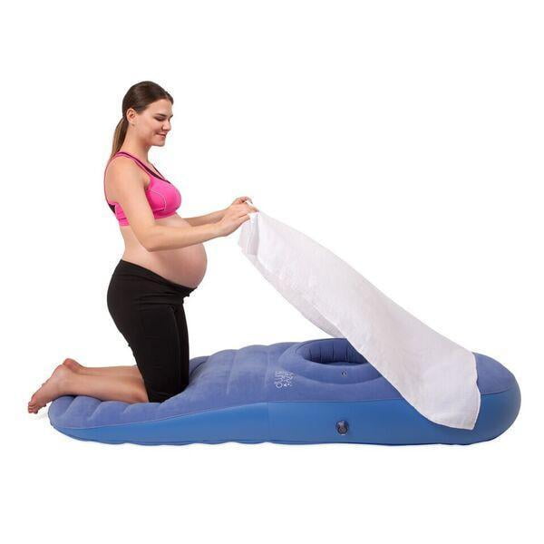 The Cozy Bump pillow helps pregnant women stomach-sleep