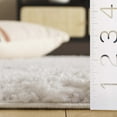 thumbnail image 4 of SAFAVIEH Rumi Barrett Striped Polyester Shag Runner Rug, Ivory/Light Beige, 2'2" x 8', 4 of 7