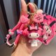 thumbnail image 1 of Llavero con colgante de cámara de proyección de dibujos animados de Sanrio con forma de perro de orejas grandes de peluche para mujer, 1 of 6