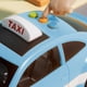 thumbnail image 5 of Taxi de juguete de estilo clásico para niños de 0 a 12 años con funciones educativas que incluyen canciones, normas de tráfico y sonidos de coche con juego interactivo., 5 of 6