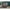 Charcoal, variant on Enclo Lincoln Cedar Color Outdoor No Dig WoodTek Vinyl Privacy Screen Enclosure for Garbage Bins and Air Conditioners (42in x 42in - 2 panels)