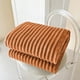 thumbnail image 3 of Manta de franela polar a rayas de microfibra acanalada para sofá, acogedora, cálida y cómoda para todas las estaciones, ideal para dormitorio, sala de estar y uso familiar. Aestivo | Naranja, 3 of 7