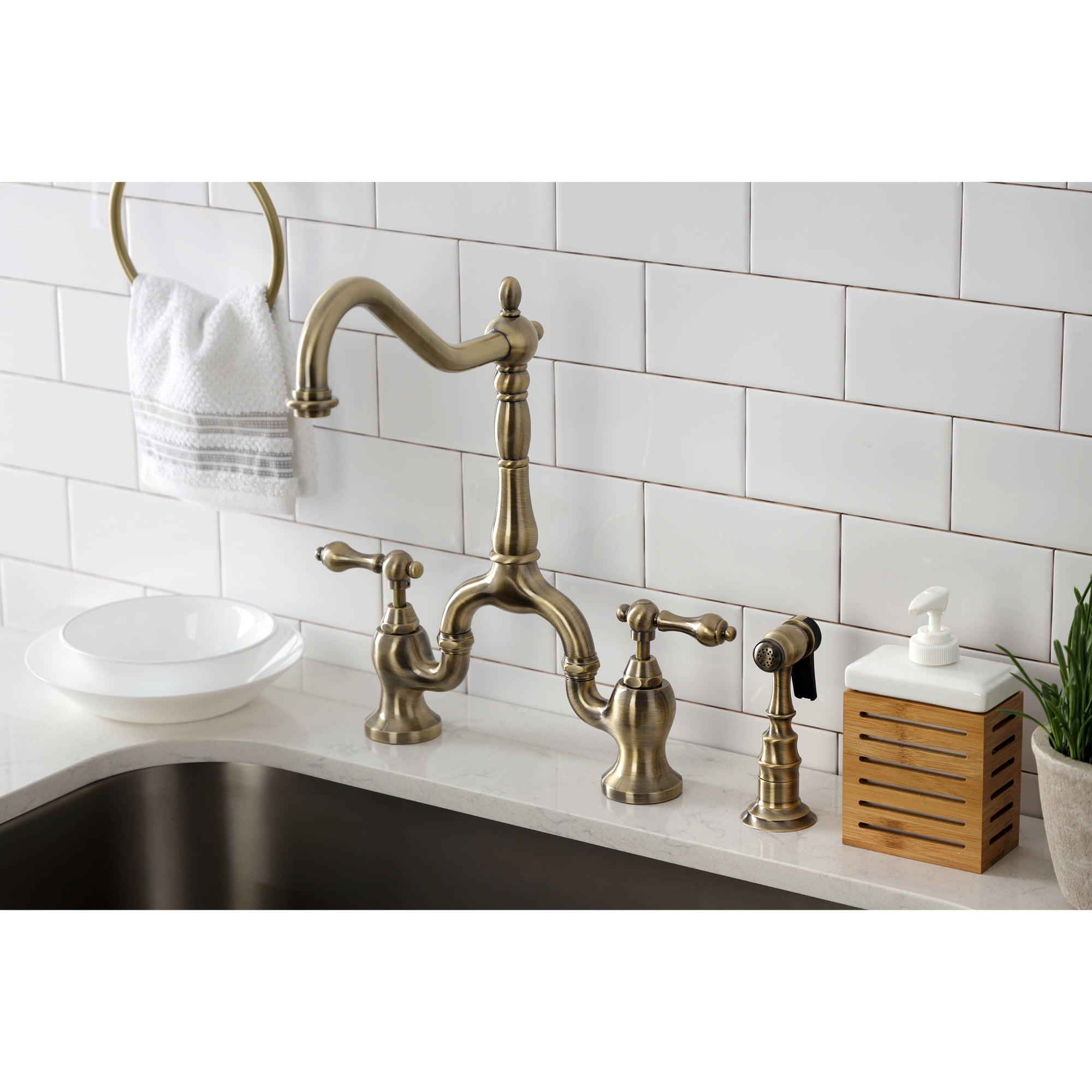 Kingston Brass KS7753ALBS English Country Two-Handle 3-Hole Deck Mount Bridge Kitchen Faucet with Brass Side Sprayer in Antique Brass
